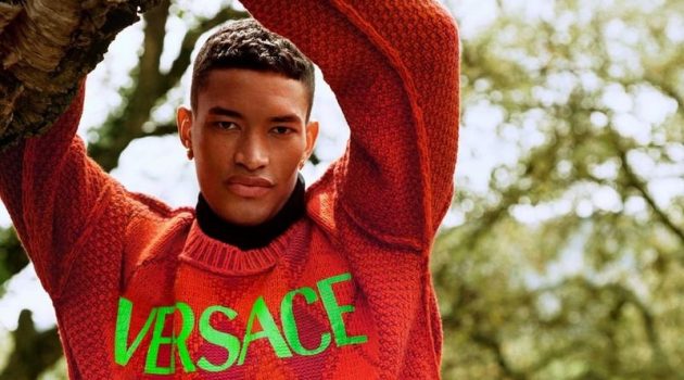 Raphael, Simone & Fernando Climb Heights for Versace Campaign Raphael Balzer dons a logo-adorned argyle sweater for Versace's pre-fall 2021 men's campaign.