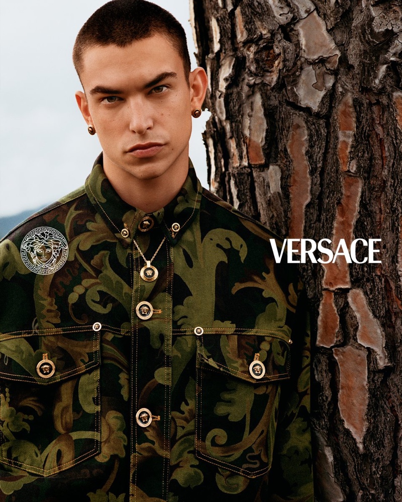 Simone Bricchi models a printed jacket for Versace's pre-fall 2021 men's campaign.