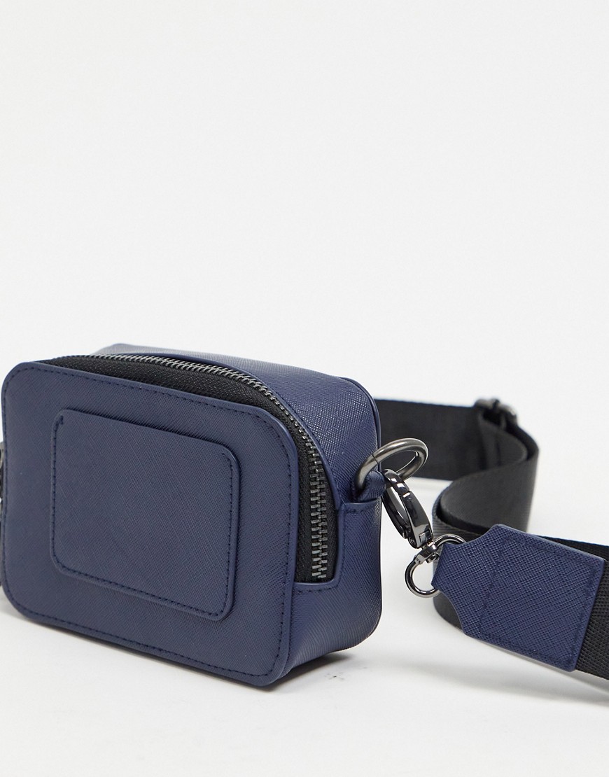 ASOS DESIGN cross body camera bag in navy faux leather | The Fashionisto