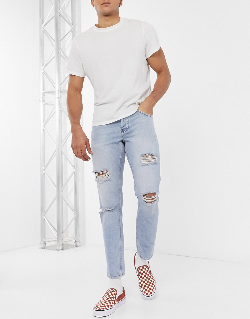 asos design baggy jeans in vintage light wash blue