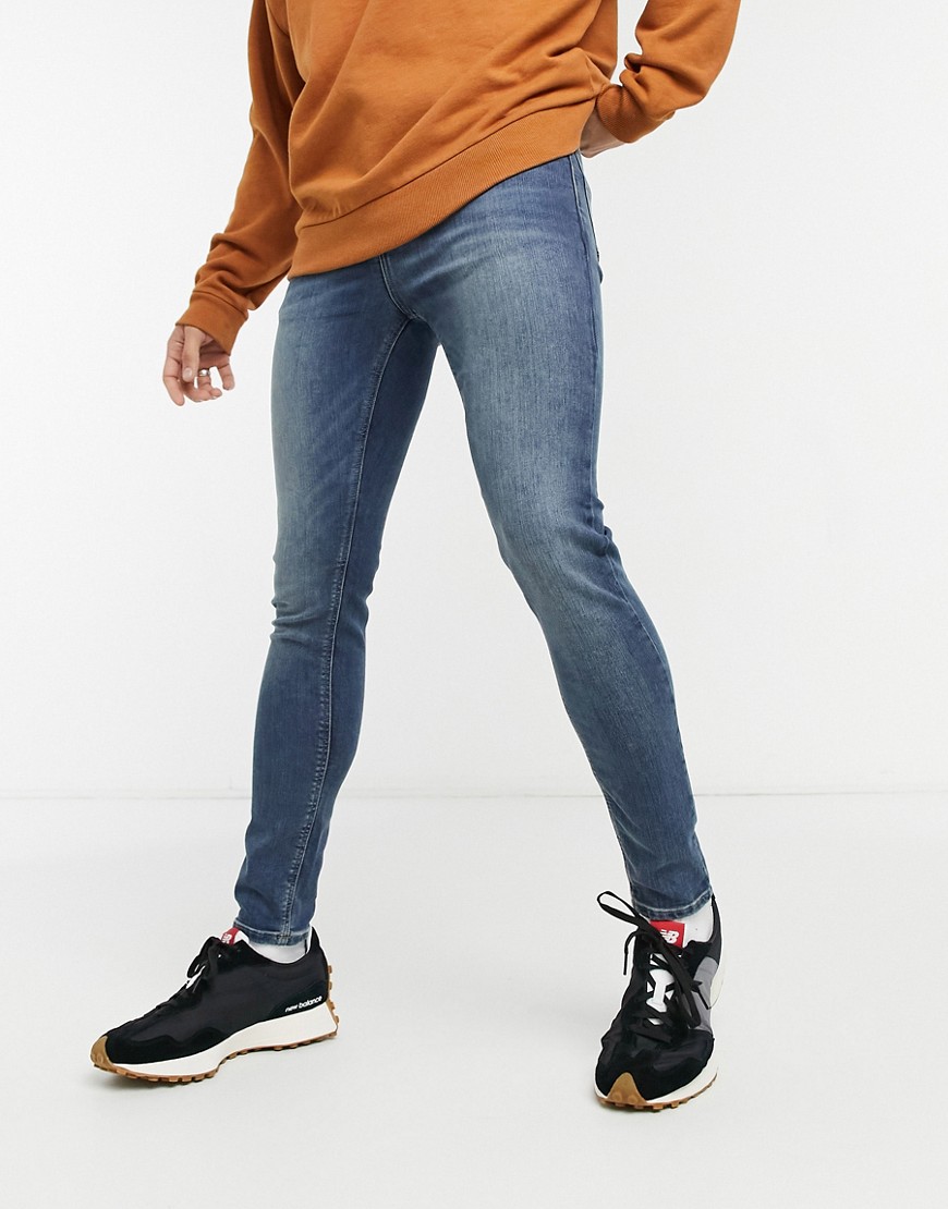 asos design stretch slim jeans in black
