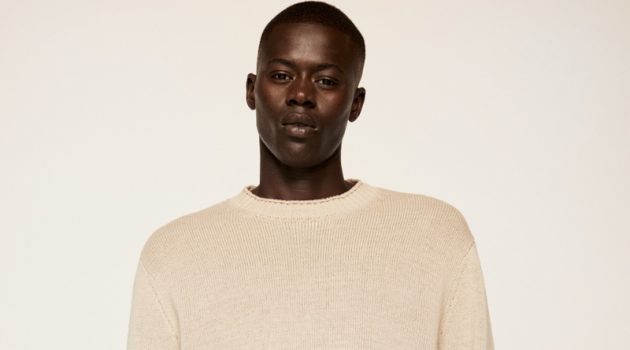 Alpha Dia Slips Into Mango's Chic Clean Collection Embracing neutrals, Alpha Dia wears a knit sweater with shorts from Mango.