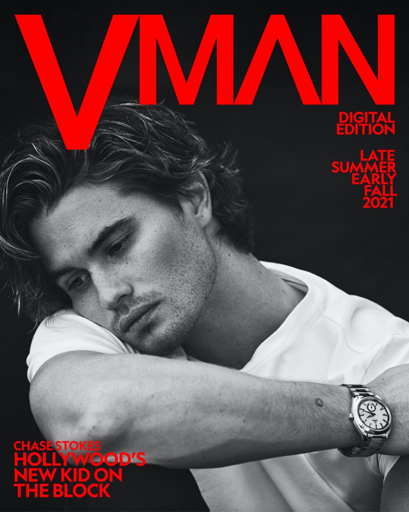 Appearing in a black and white photo for VMAN, Chase Stokes wears an Armani Exchange t-shirt with an Omega Seamaster Aqua Terra Small Seconds watch.