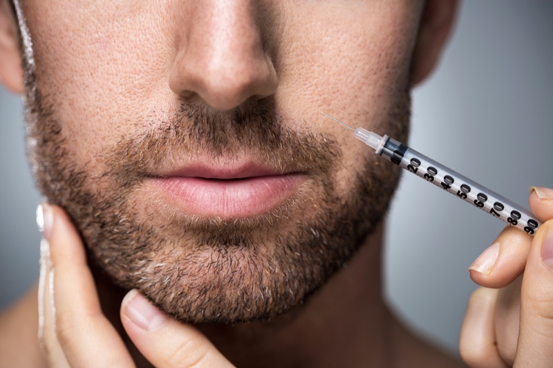 Closeup Man Botox Face Needle