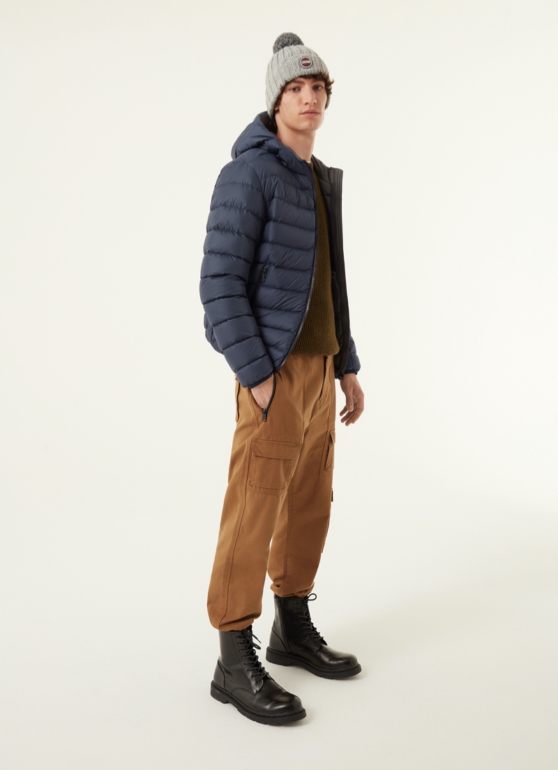 Oliver Bartha bundles up for the cold in a Colmar Originals sporty hooded down jacket in blue. » Colmar Originals' New Minimalist Fall Collection Has Arrived Oliver Bartha bundles up for the cold in a Colmar Originals sporty hooded down jacket in blue.
