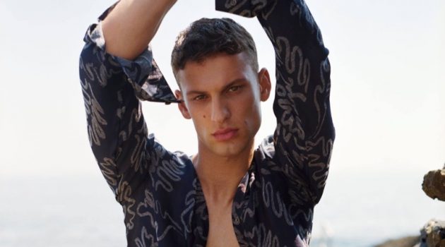 David Trulik Summers with Giorgio Armani Sporting an open printed shirt, David Trulik stars in Giorgio Armani's summer 2021 men's campaign.