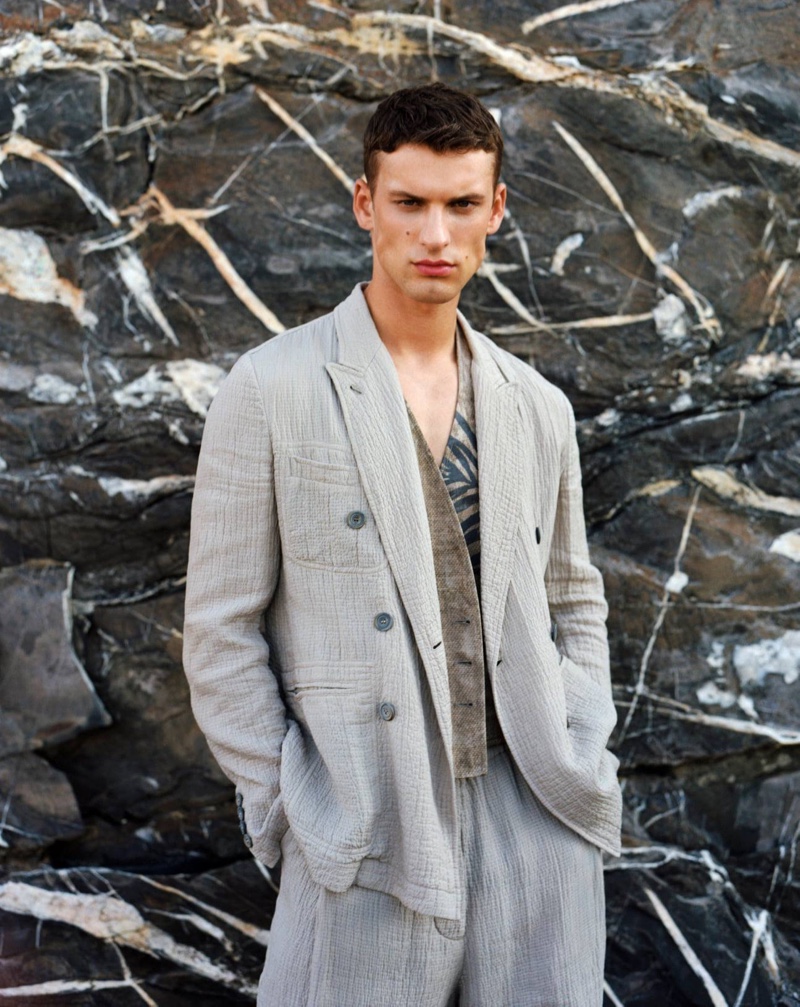 Reuniting with Giorgio Armani for its summer 2021 men's campaign, David Trulik is a chic vision in lightweight tailoring.