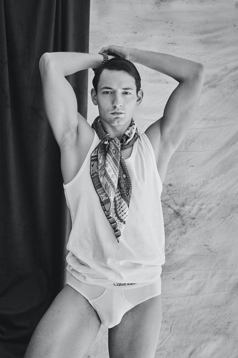 Guille wears scarf Prada, bracelet Bodhi Mala, tank and underwear Calvin Klein.