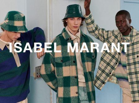 Models Fernando Lindez, Freek Iven, and Alpha Dia sport fall-winter 2021 looks from Isabel Marant.