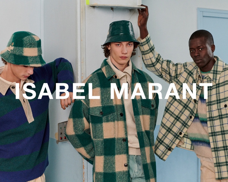 Models Fernando Lindez, Freek Iven, and Alpha Dia sport fall-winter 2021 looks from Isabel Marant. 