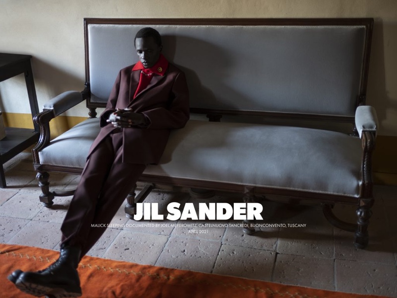 A luxurious vision, Malick Bodian appears in Jil Sander's fall-winter 2021 men's campaign.