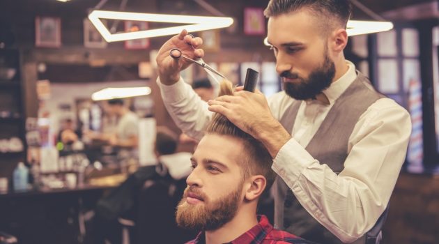 The Top 10 Trending Short Haircuts for Men Man at Barbershop Hairstyle