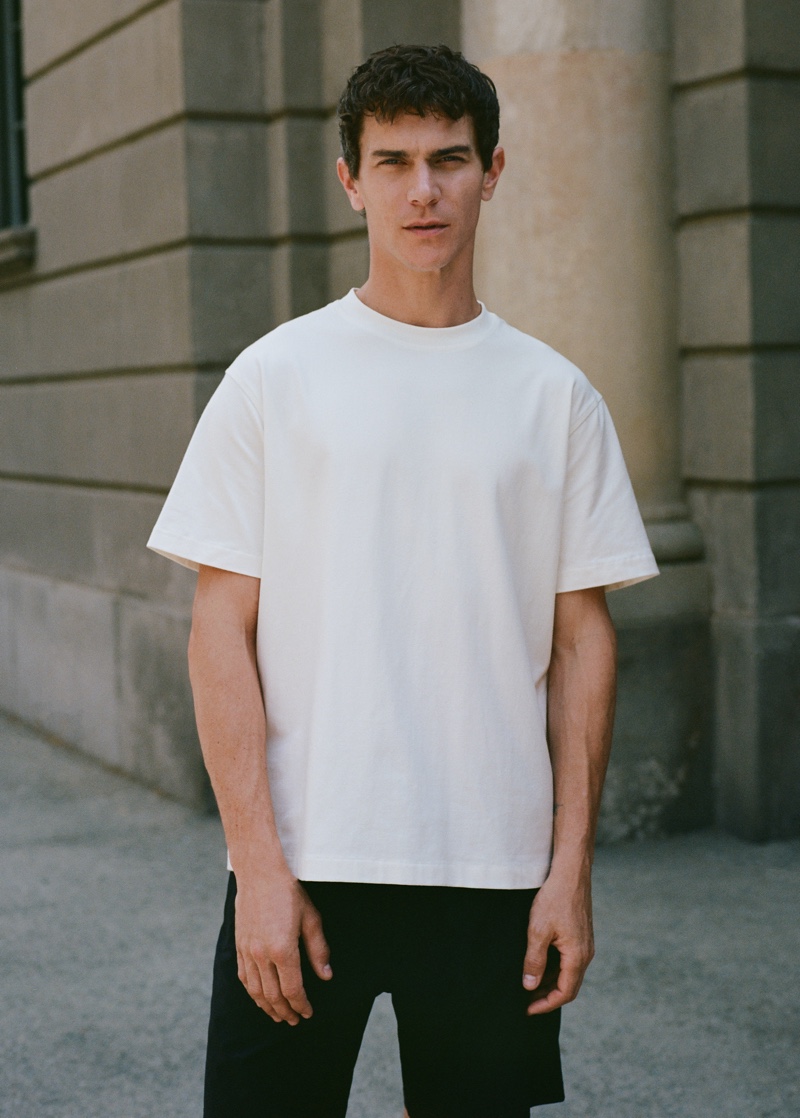 Vincent Lacrocq wears a simple white t-shirt with shorts from Mango Man's Leisure collection.