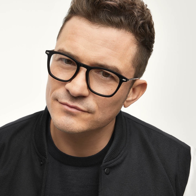 Front and center, Orlando Bloom sports black framed glasses for BOSS's eyewear campaign.