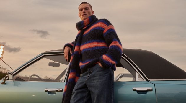 William & Roman Don Kenzo Knits for Stylebop Campaign William Los models a matching striped sweater and scarf from Kenzo.