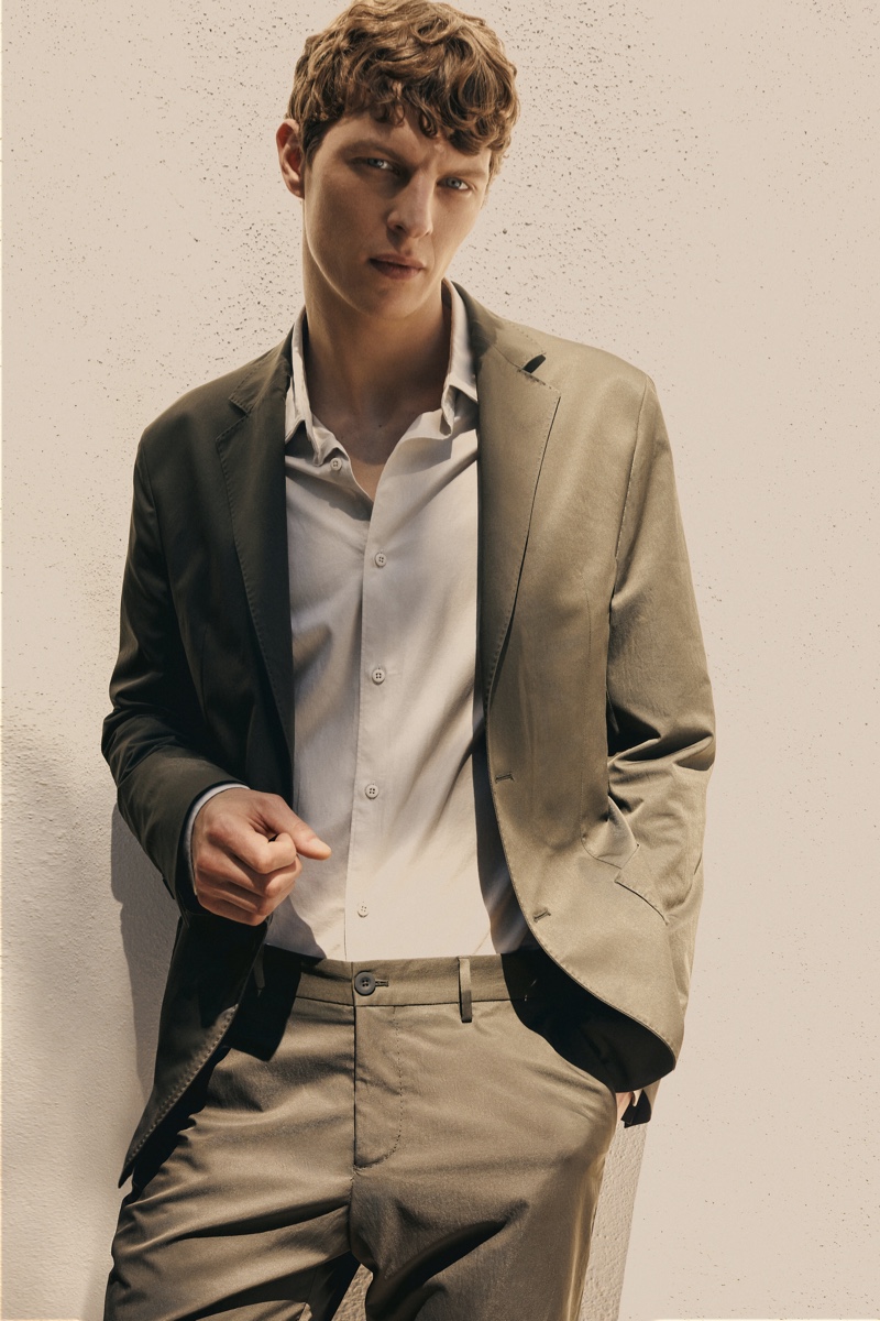 Donning a leisure suit, Tim Schuhmacher fronts a new editorial from Massimo Dutti.