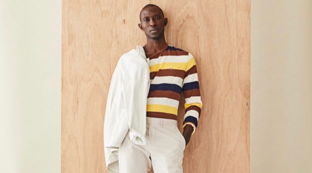 Armando Cabral Dons Smart Pre-Fall Style from Todd Snyder Front and center, Armando Cabral dons a long-sleeve striped pocket tee with a neutral-colored jacket and pants from Todd Snyder.