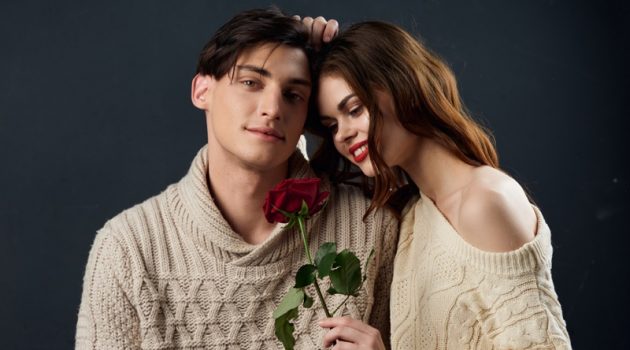 Gift Idea: Long Lasting Roses Young Couple Knit Sweaters Woman Holding Rose