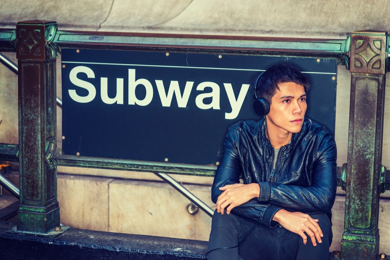 Young Man Leather Jacket Subway Sign