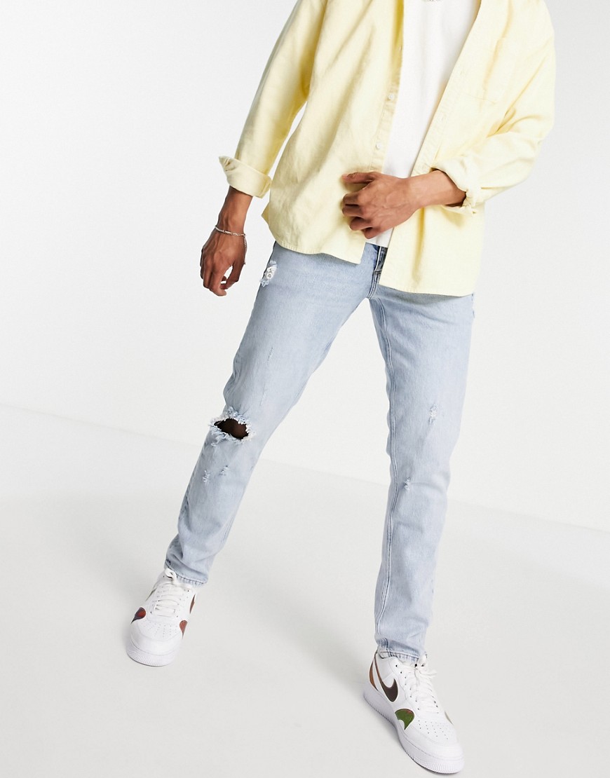 asos design baggy jeans in vintage light wash blue