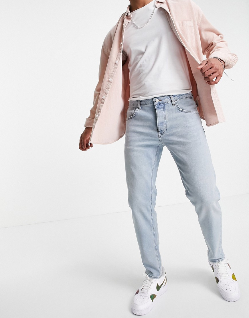 asos design baggy jeans in vintage light wash blue