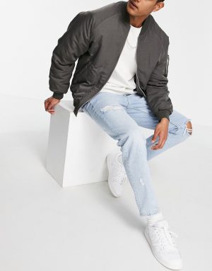 ASOS DESIGN tapered jeans in 90's light wash with rips-Blues ASOS DESIGN tapered jeans in 90's light wash with rips-Blues
