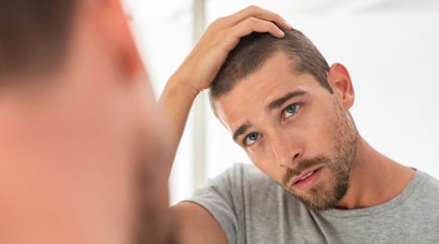 How to Know If You're Balding and Steps to Take Attractive Man Shaved Haircut Mirror