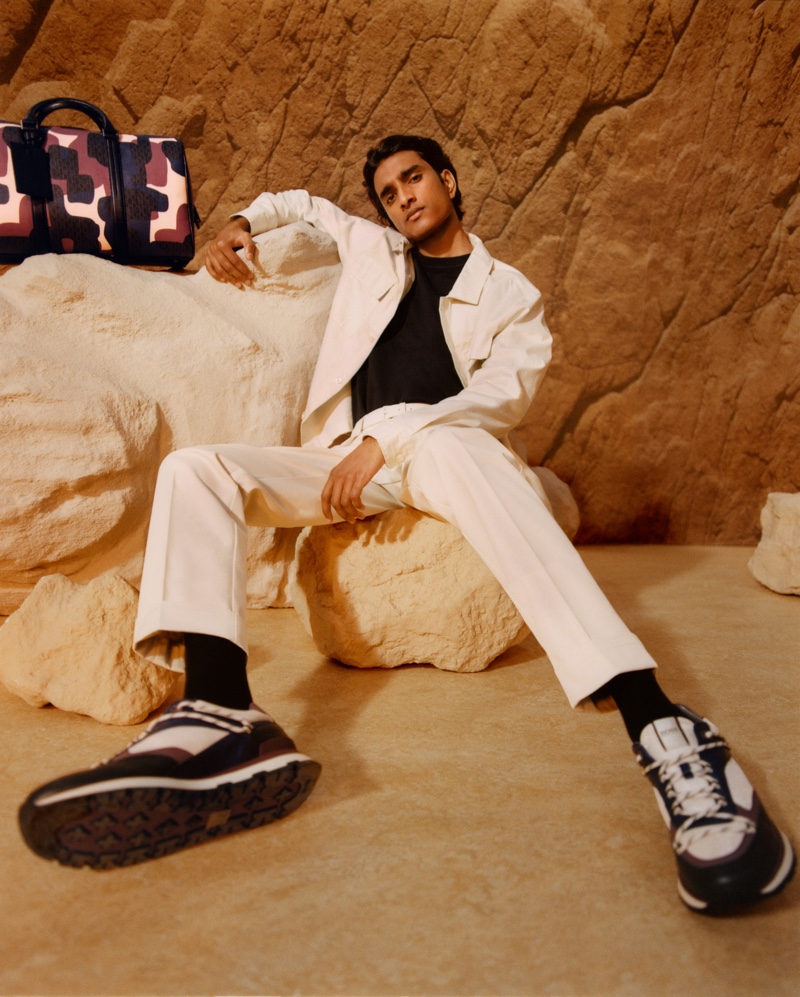 Standing out in a clean white look, Jeenu Mahadevan fronts BOSS's fall-winter 2021 men's campaign.