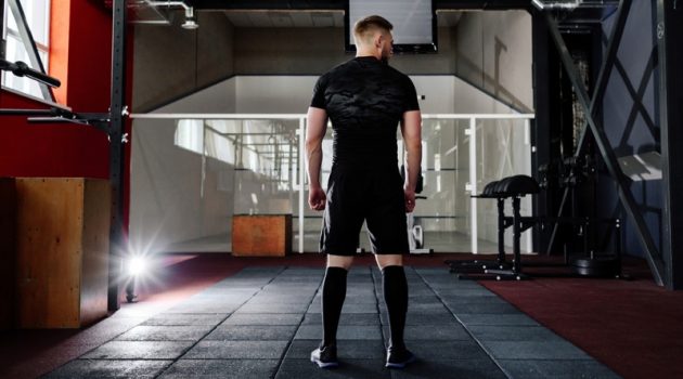 Busting 5 Common Myths About Compression Socks Back Muscular Man Gym