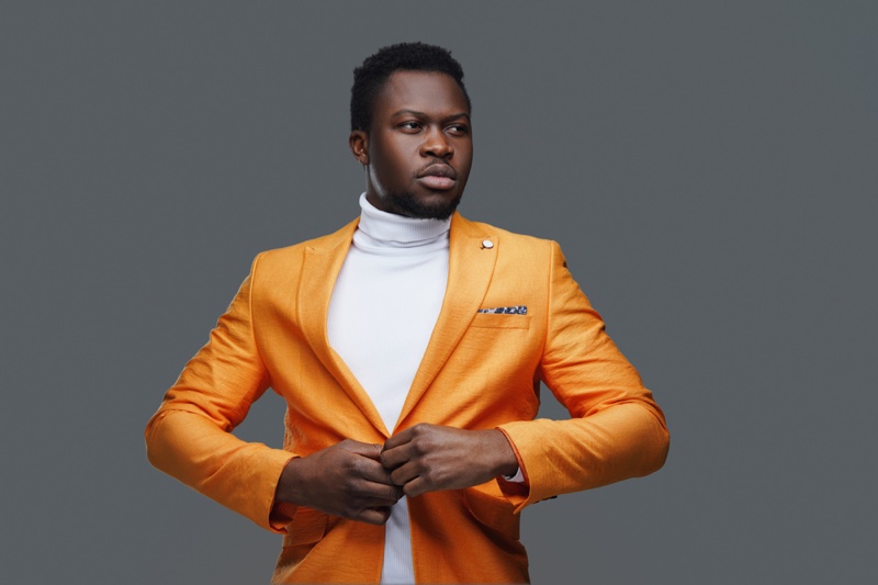 Black Man Orange Blazer Fashionable