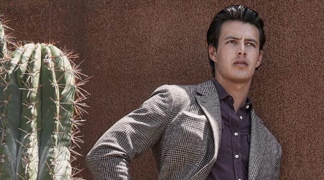 Harry Gozzett Inspires in Smart Denim Looks by Brunello Cucinelli Connecting with Brunello Cucinelli for fall, Harry Gozzett dons a herringbone blazer over a button-down shirt with distressed denim jeans.