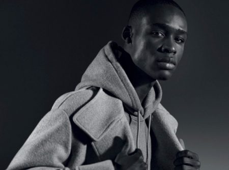 Bano Sow reunites with the Armani brand, starring in Emporio Armani's fall-winter 2021 men's campaign.