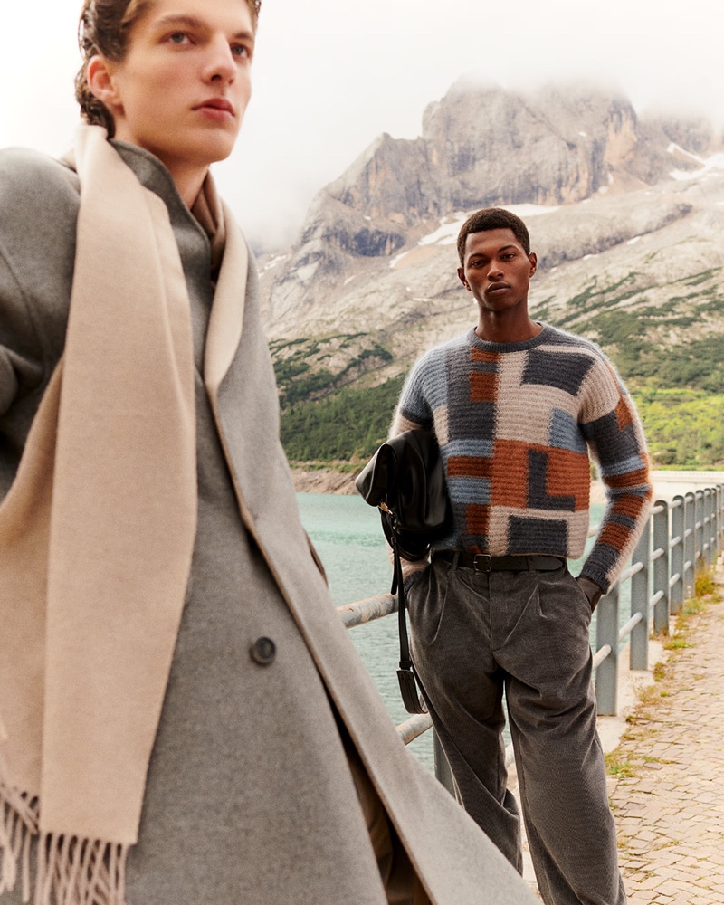 Pictured alongside Hugo Gillain, Fabio Tavares wears a mohair and silk jacquard sweater by Giorgio Armani.