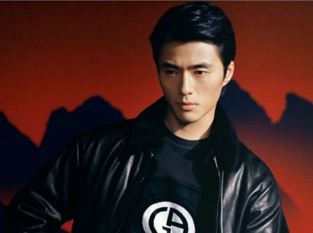 Donning a modern look with a leather bomber jacket, Zhao Lei appears in Giorgio Armani's fall-winter 2021 men's campaign.