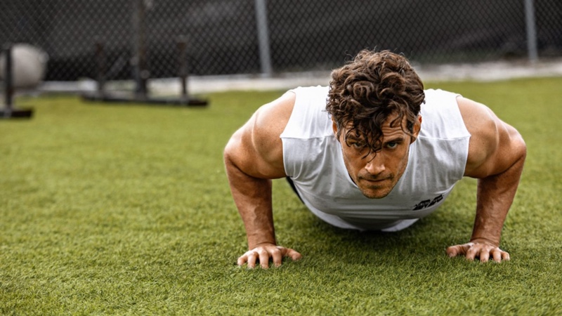 Doing pushups, actor Henry Cavill appears in a new MuscleTech campaign.