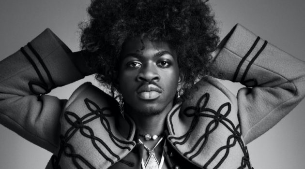 Lil Nas X Channels Jimi Hendrix for VMAN, Talks 'Montero' Album Channeling Jimi Hendrix, Lil Nas X wears a Louis Vuitton jacket with vintage fashions and accessories for VMAN.