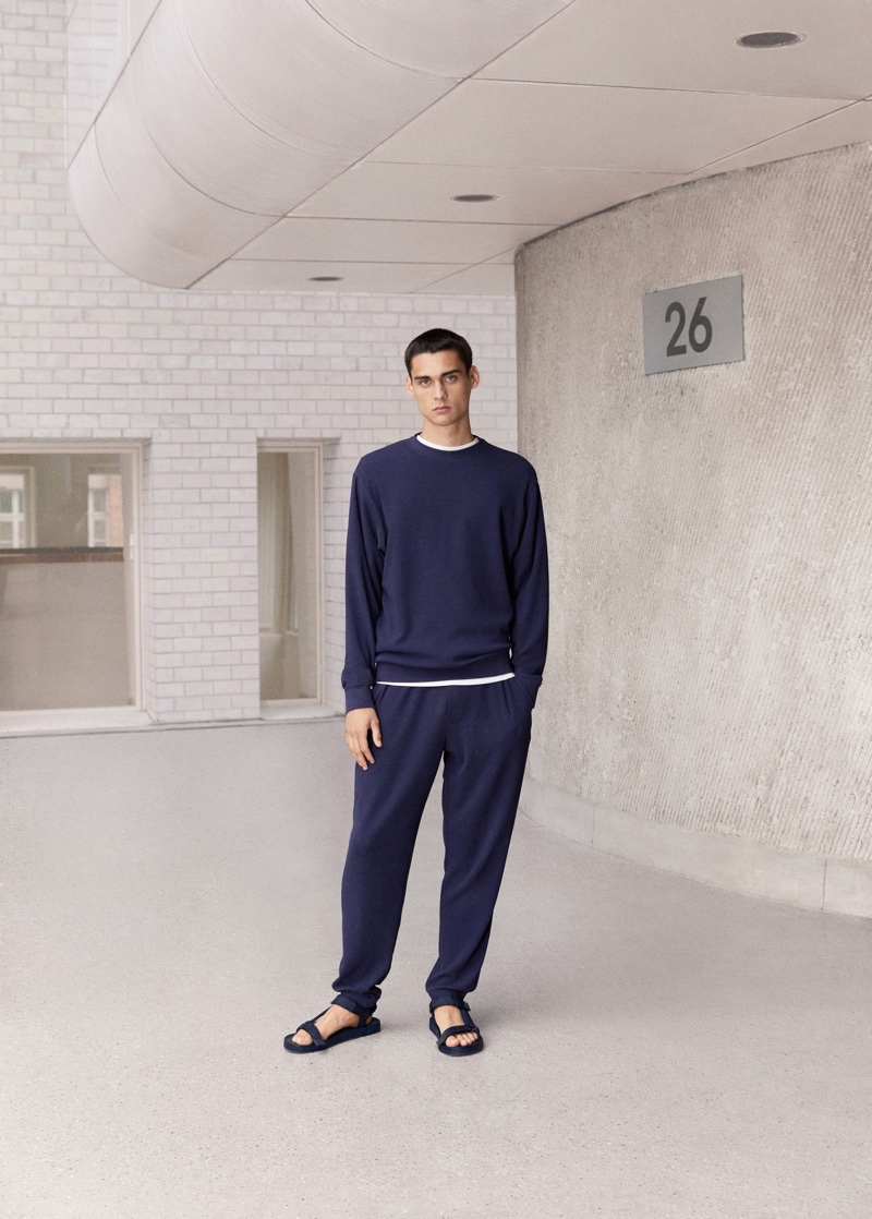 Front and center, Ludwig Wilsdorff makes a case for leisure in Mango Man's structured cotton sweatshirt and joggers.