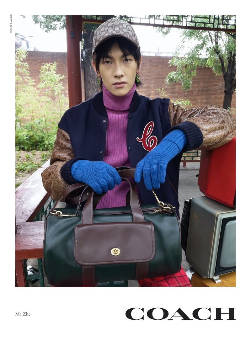 Juergen Teller photographs Ma Zhe for Coach's fall 2021 accessories campaign.Juergen Teller photographs Ma Zhe for Coach's fall 2021 accessories campaign.