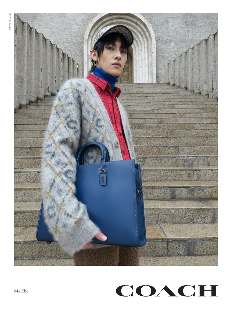 Ma Zhe takes hold of the Rogue Brief for Coach's fall 2021 campaign.