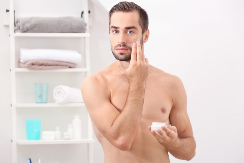 Man Applying Face Cream » 5 Tips to Reduce Skin Aging Man Applying Face Cream