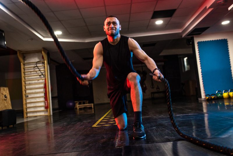 Man Training with Battle Ropes