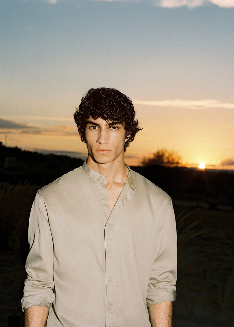 Spending a day at the beach, Duncan Yair dons Mango's relaxed cotton mandarin collar shirt.