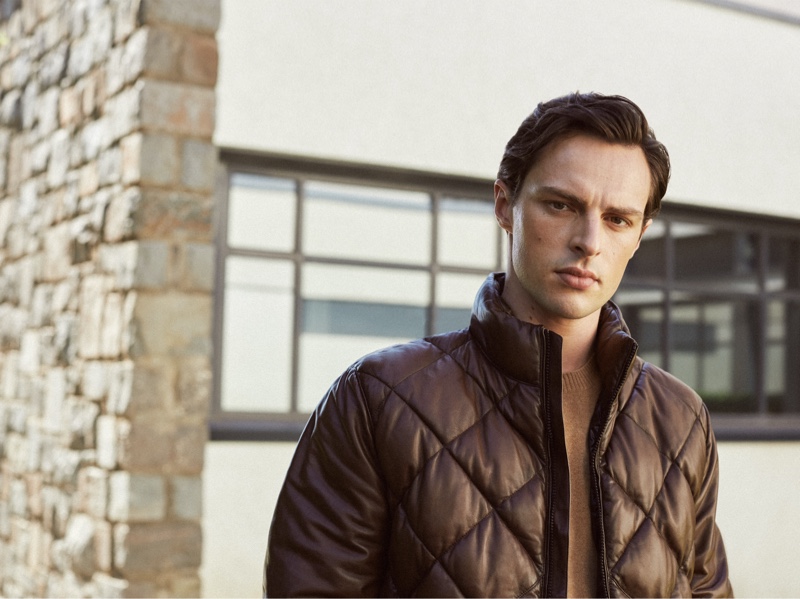 Embracing monochromatic style, Jack Hurrell wears a sweater and quilted jacket by Massimo Dutti.