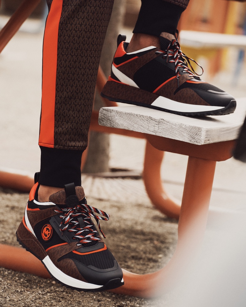 MICHAEL Michael Kors puts the spotlight on its new brown sneakers for its #MKGO fall-winter 2021 campaign.