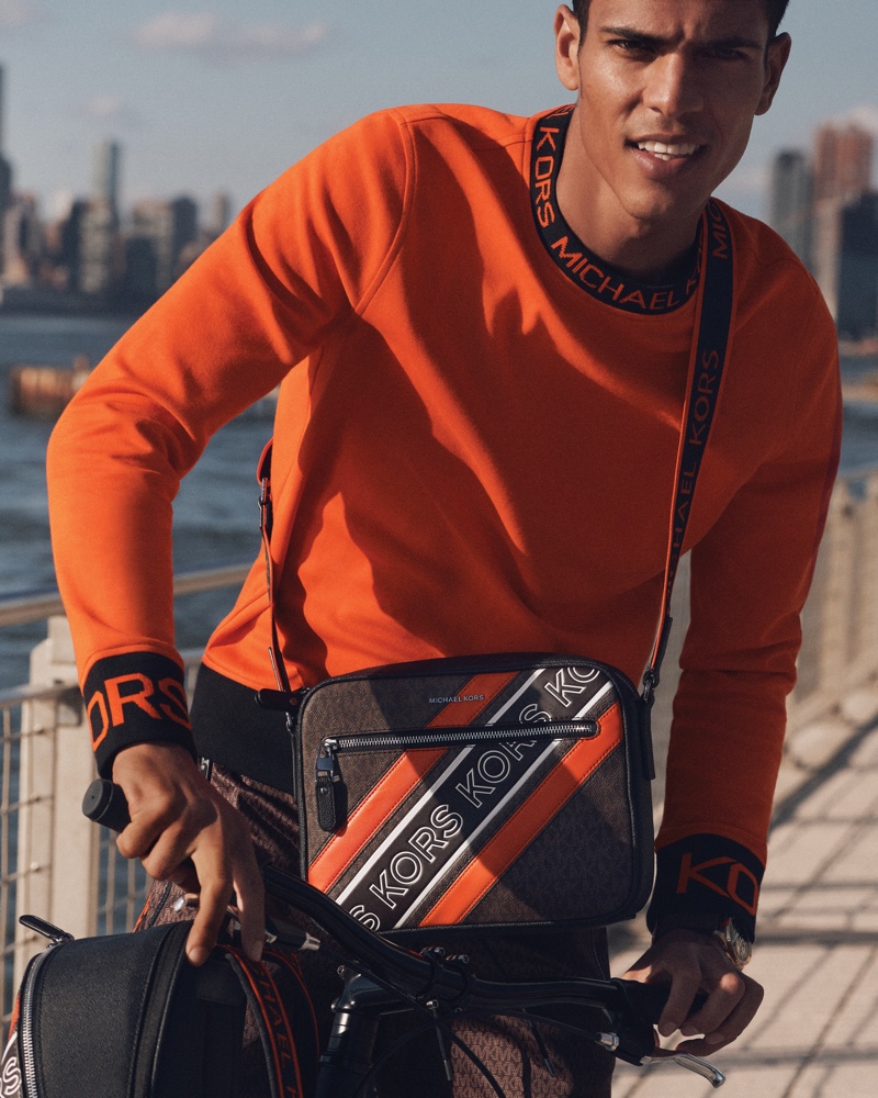 On the move as the face of MICHAEL Michael Kors, Geron McKinley showcases pieces from the new #MKGO fall-winter 2021 collection.