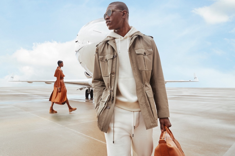 Dominique Hollington is a stylish traveler in Ralph Lauren for Neiman Marcus' fall 2021 men's campaign.