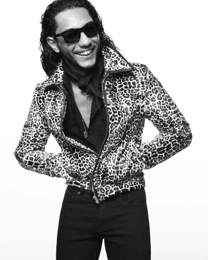 All smiles, Dylan Robert stars in Saint Laurent's fall-winter 2021 men's campaign.