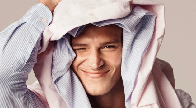 Matthew Noszka Embraces All American Style for Tommy Hilfiger Fall '21 Campaign In front and center, Matthew Noszka models the classic oxford shirt for Tommy Hilfiger's fall 2021 men's campaign.