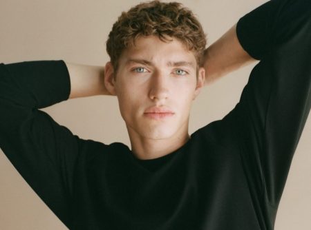 Valentin Humbroich takes comfort in a stretch round neck sweater by Mango Man.