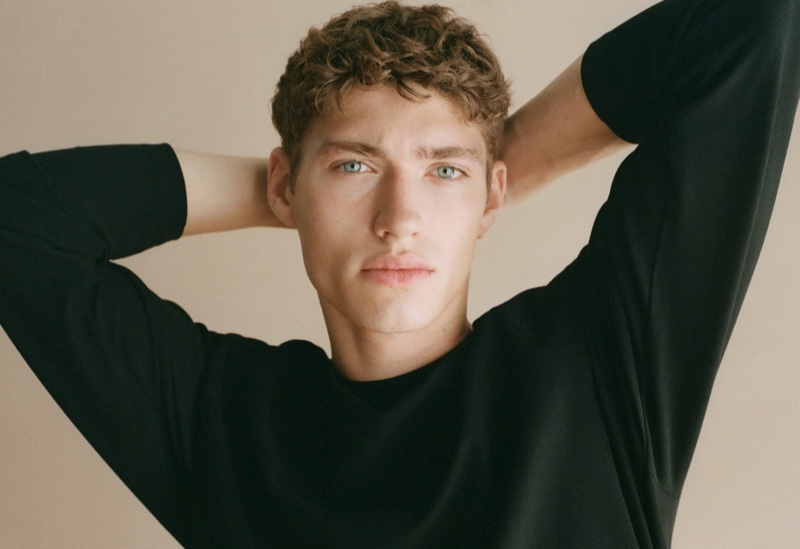 Valentin Humbroich takes comfort in a stretch round neck sweater by Mango Man.